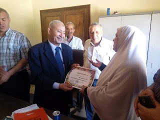 تكريم مديرة الشئون المالية بزراعة الفيوم (صور)
